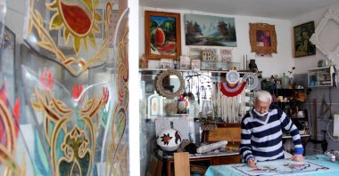 Serdar Arslan with his works in his workshop, Muğla, southwestern Turkey, Dec. 4, 2020. (AA PHOTO)