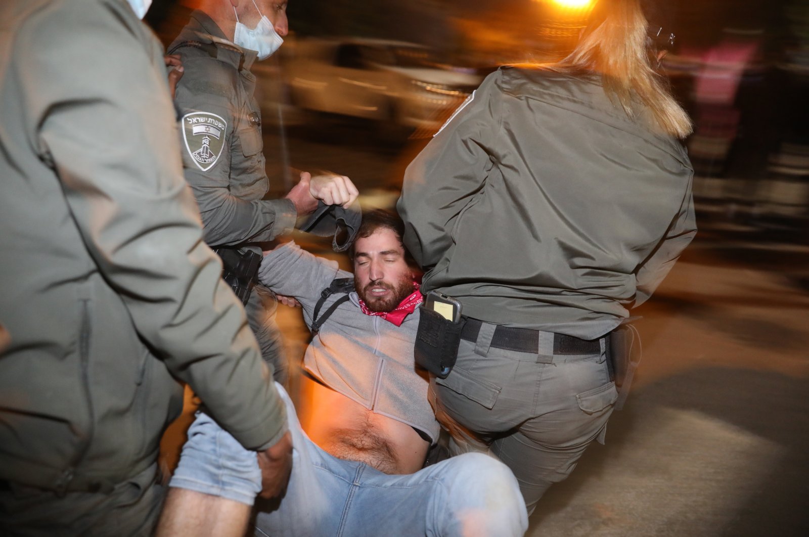 Police arrest an Anti-Netanyahu protester during a rally against the Israeli Prime Minister outside his residence, in Jerusalem, Israel, 05 December 2020. (EPA Photo)