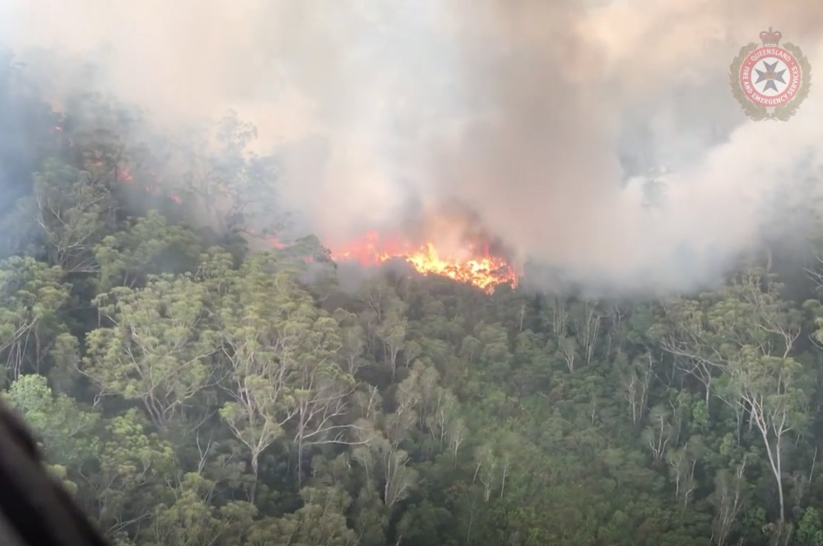 An aerial view shows bushfires on Fraser Island, Queensland, Australia, in this still image taken from video released on December 2, 2020. (Queensland Fire and Emergency Services/via Reuters)