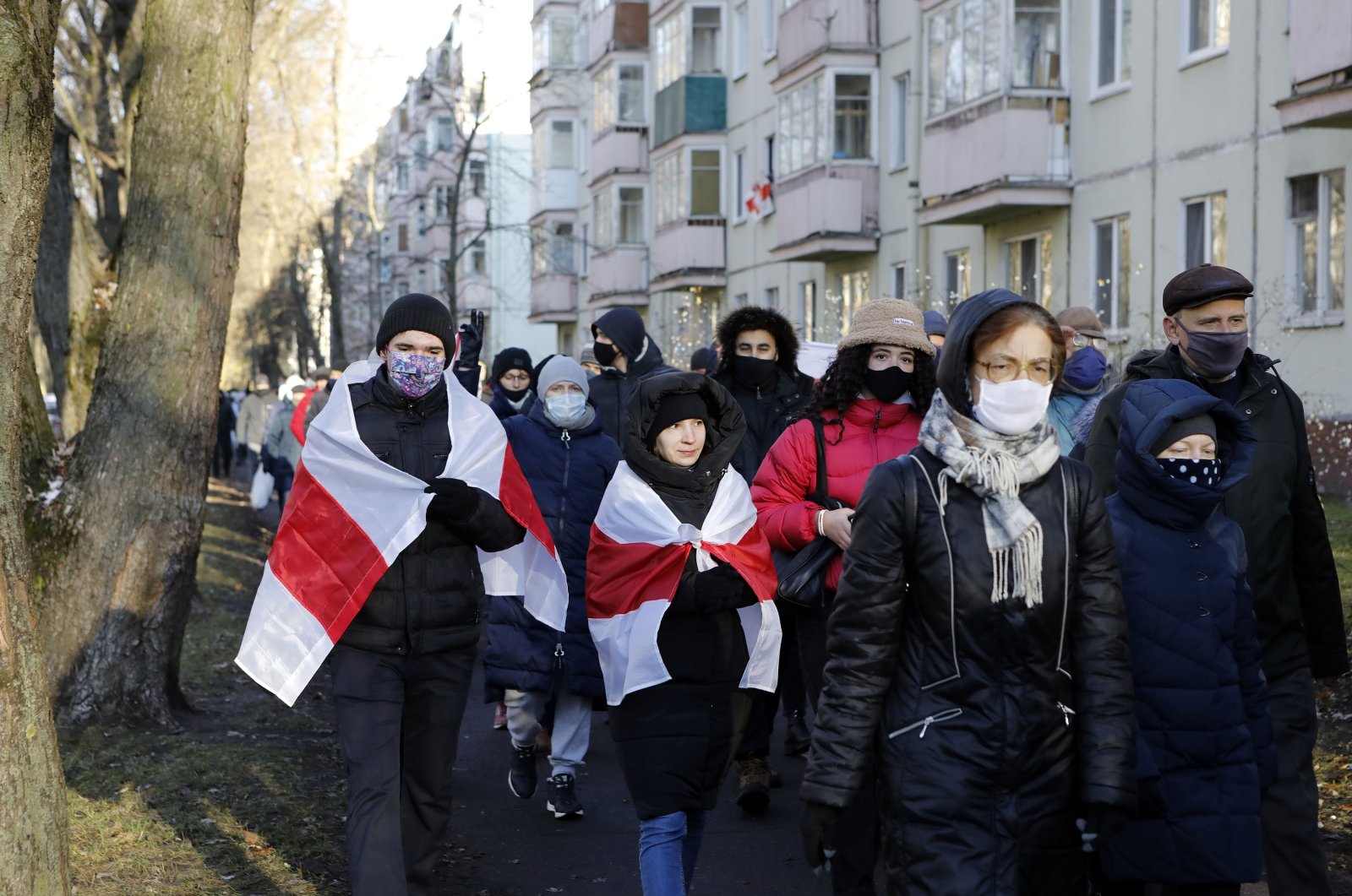 Demonstrators, most of them wearing face masks to help curb the spread of the coronavirus, attend an opposition rally to protest the official presidential election results in Minsk, Belarus, Dec. 6, 2020. (AP Photo)