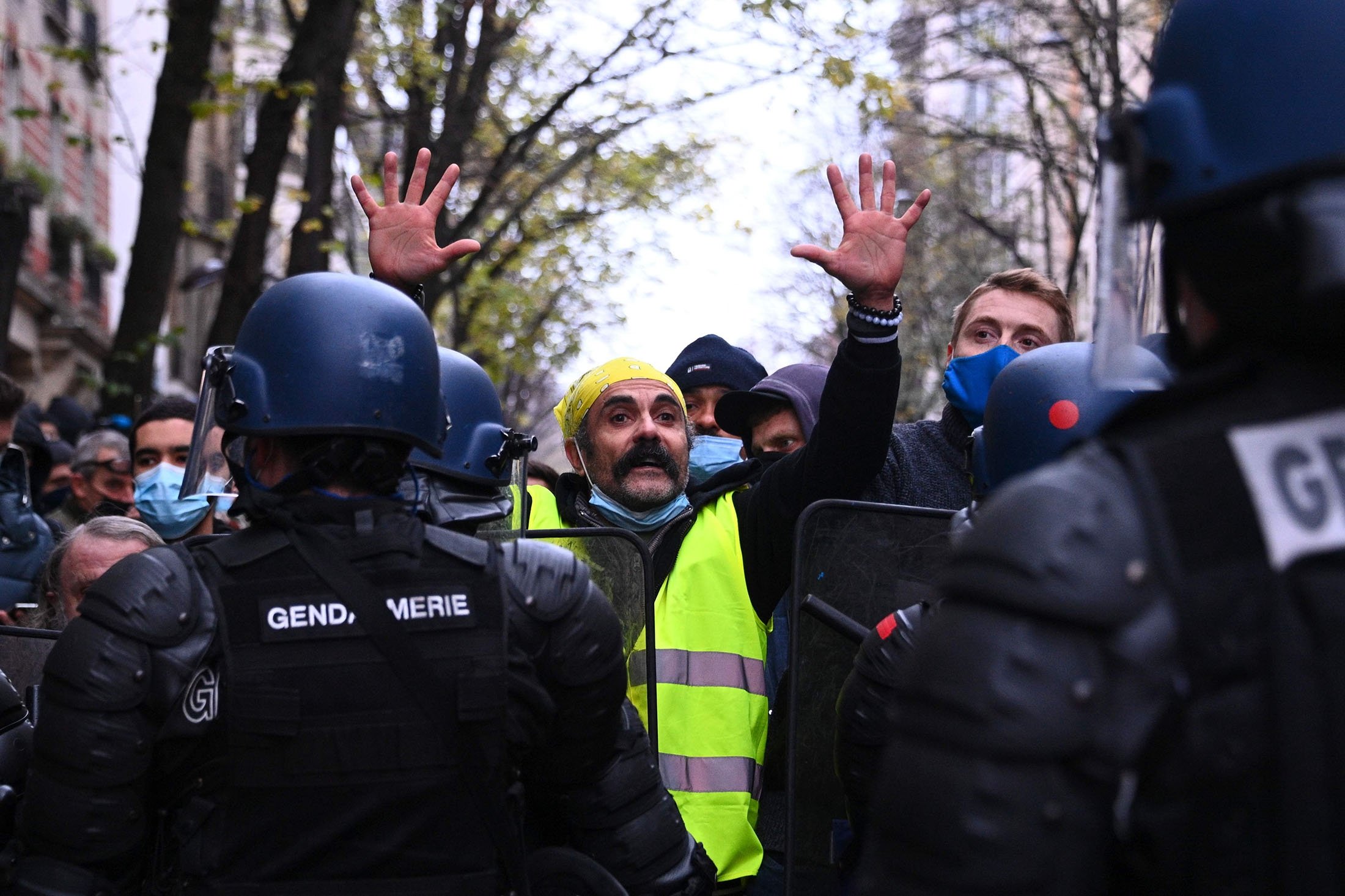 In photos: France descends into chaos amid protests against police ...