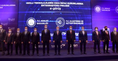 Justice Minister Abdulhamit Gül (6th from L) and Transport and Infrastructure Minister Adil Karaismailoğlu (6th from R) attend the introductory meeting of the "Project of Integrating Smart Technologies into Penal Institutions," Ankara, Turkey, Oct. 22, 2020.
