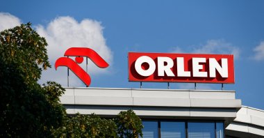 Logo of the PKN Orlen on the top of a building, Warsaw, Poland, July 4, 2018. (Shutterstock Photo by Mateusz Szymanski)