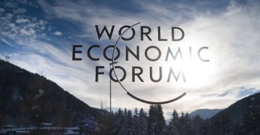 The sign of the World Economic Forum (WEF) is displayed at an entrance door at the congress center on the eve of the meeting in Davos, Switzerland, Jan. 20, 2019. (AP Photo)