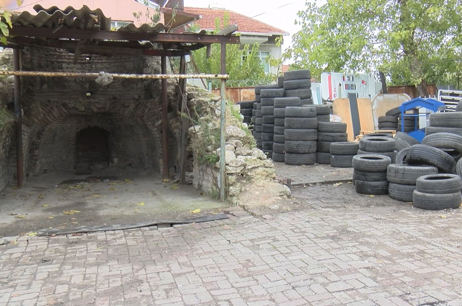 A view of the chapel next to stacks of tires, in Istanbul, Turkey, Dec. 6, 2020. (DHA Photo)