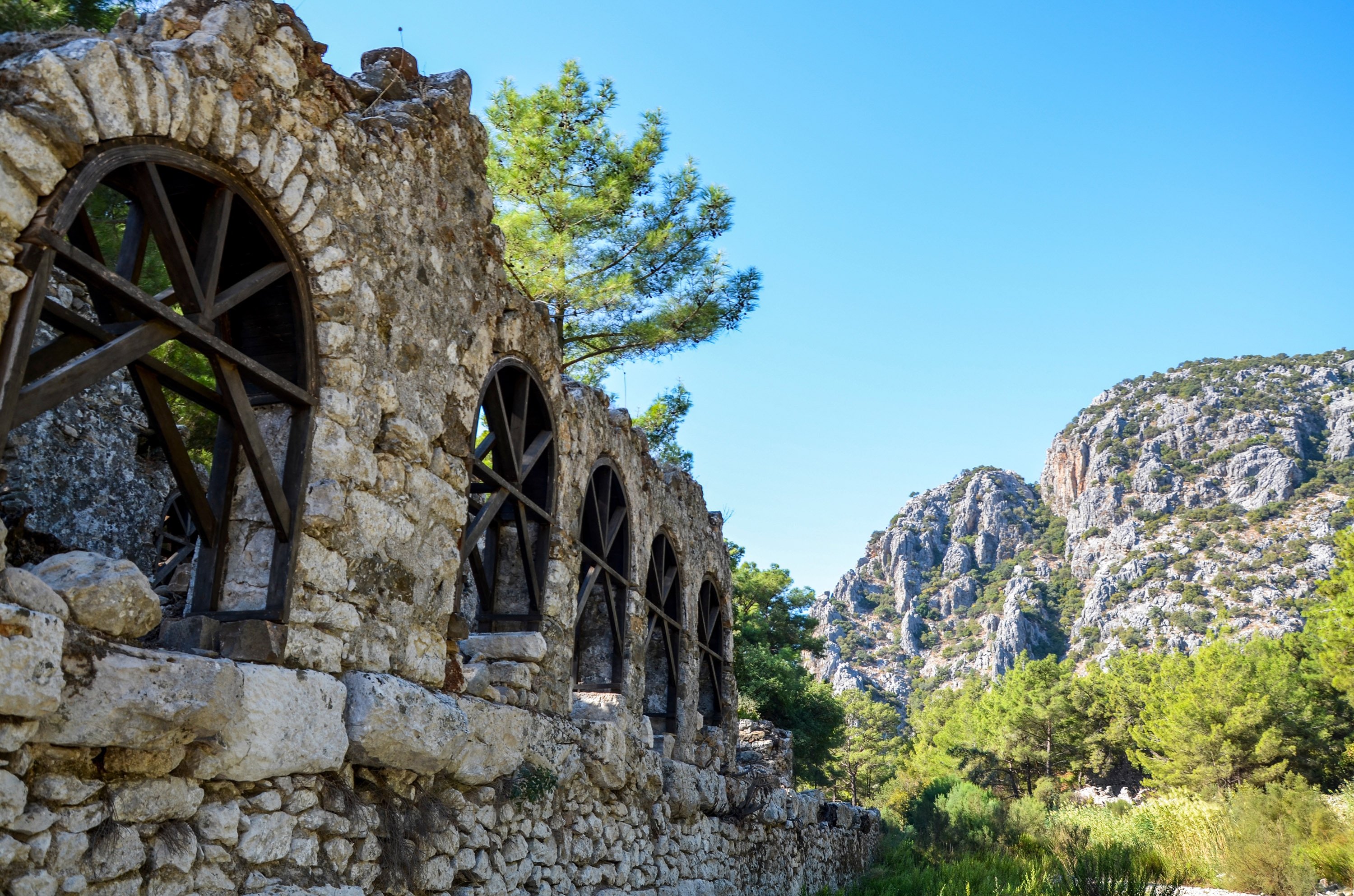 Ruins of stone walls of the ancient city Olympos in Çıralı, Antalya along the Lycian Way on the Mediterranean coast. (Shutterstock Photo)
