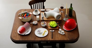 Various plastic goods weighing 3.15 kilograms, which is equivalent to the amount of plastic that someone could eat in ten years, are displayed on a table in this illustration taken in Tokyo, March 31, 2020. (Reuters Photo)