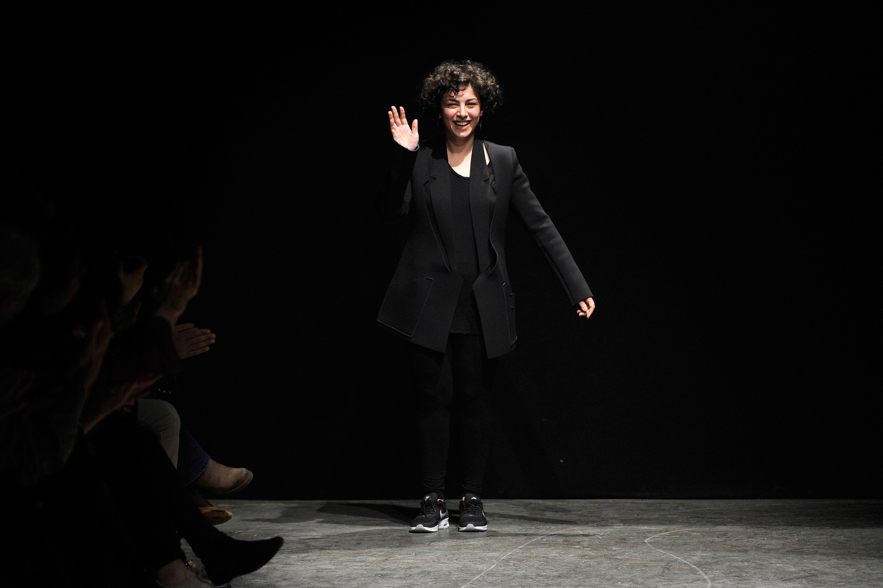 Fashion designer Özlem Kaya appears at the end of the runway following the Özlem Kaya show during MBFWI presented by American Express Fall/Winter 2014 on March 15, 2014 in Istanbul, Turkey.  (Getty Images for IMG)