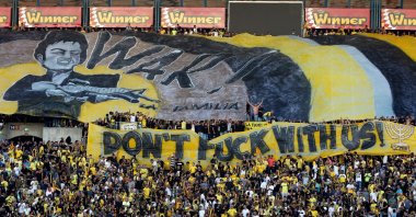 Beitar Jerusalem fans hold up banners prior to the UEFA Europa League play-off football match between Beitar Jerusalem and AS Saint-Etienne, at the Itztadion Teddy Stadium in Jerusalem, Aug. 17, 2016. (AFP Photo)