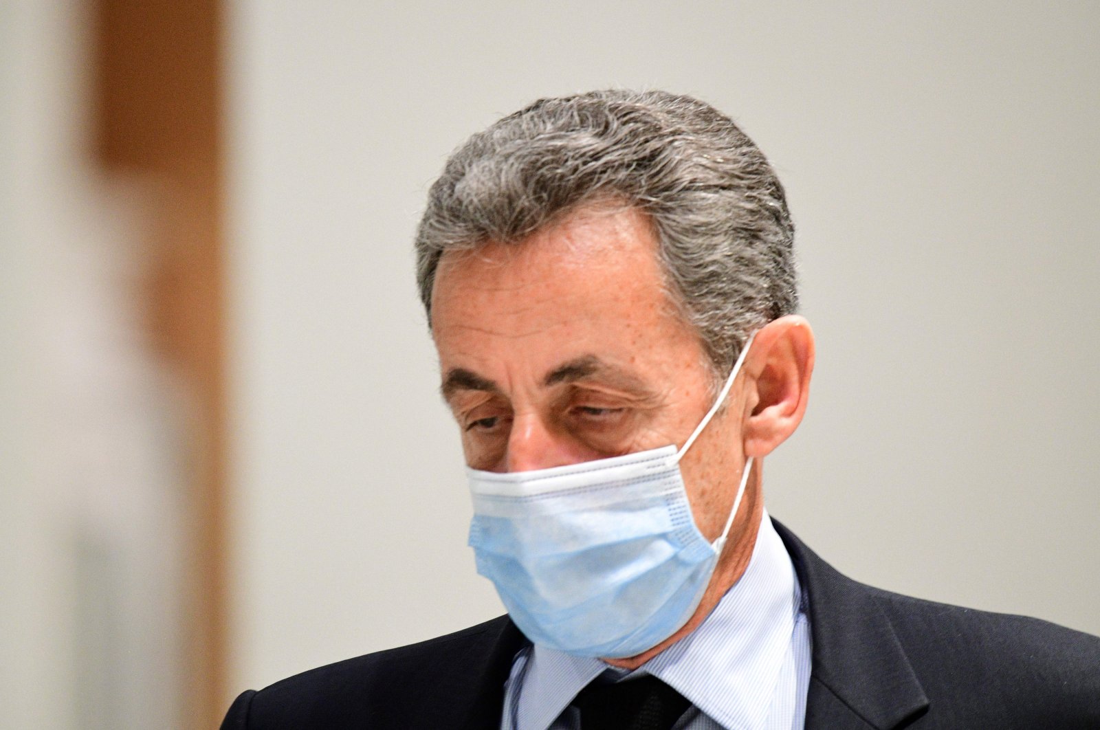 Former French President Nicolas Sarkozy leaves after a hearing during his trial on corruption charges at the courthouse in Paris, Dec. 8, 2020. (AFP Photo)