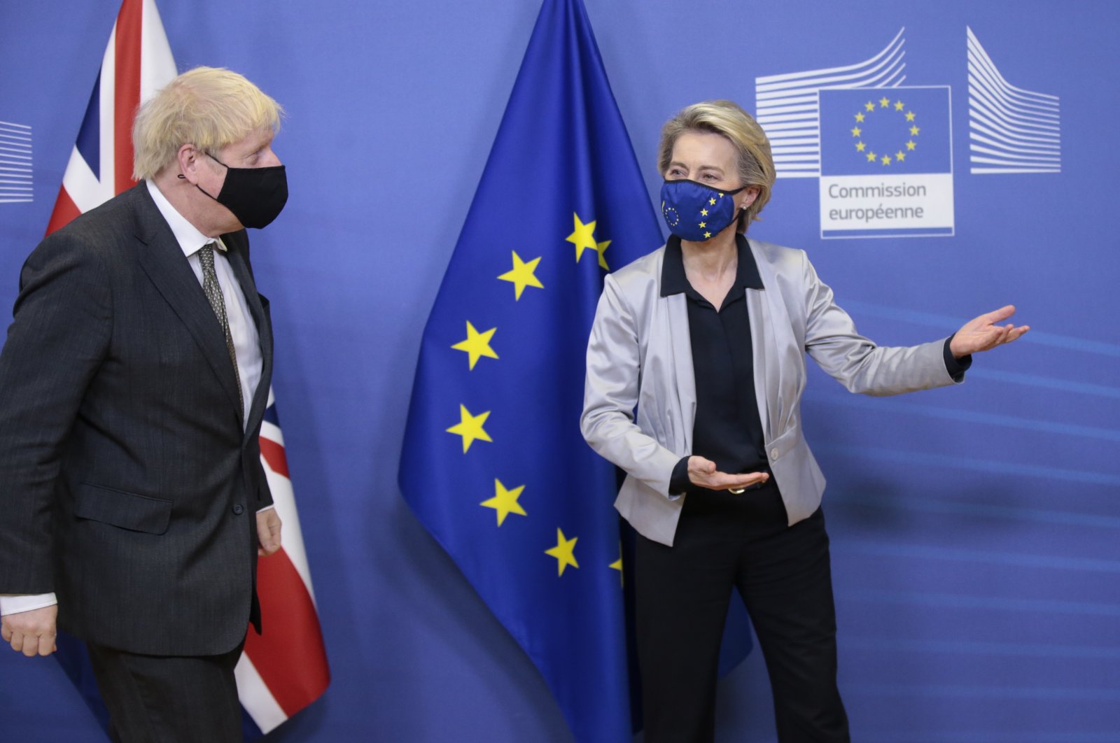 Britain's Prime Minister Boris Johnson (L) is welcomed by European Commission President Ursula von der Leyen (R) prior to post-Brexit trade deal talks, in Brussels, Belgium, 09 December 2020. (EPA Photo)
