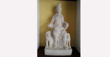 The marble statue of Cybele features lions on either side.