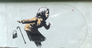 A new street artwork entitled "Aachoo!!" by Banksy is seen in Totterdown, Bristol, Britain, Dec. 11, 2020. (REUTERS Photo)