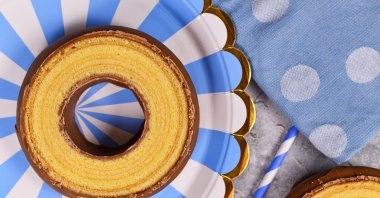 The traditional German-layered winter cake "Baumkuchen" is usually served glazed with chocolate. (Shutterstock Photo)