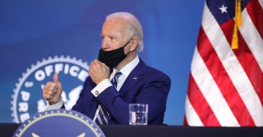 U.S. President-elect Joe Biden gives the thumbs-up as he adjusts his mask during a meeting in Wilmington, Delaware, the U.S., Dec. 9, 2020. (AFP Photo)