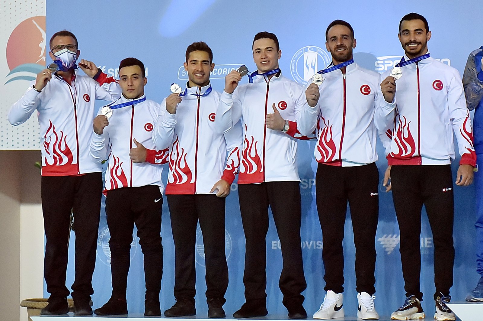 Turkish athletes pose with their medals at the European Championships in Men's Artistic Gymnastics in Mersin, Turkey, Dec. 12, 2020. (AA Photo)