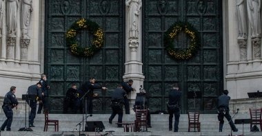 Police officers surround a suspect who was shooting outside the Cathedral Church of St. John the Divine in the Manhattan borough of New York City, New York, U.S., Dec. 13, 2020. (Reuters Photo)