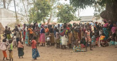 Displaced women meet at the Centro Agrrio de Napala where hundreds of displaced are sheltered after fleeing attacks by armed insurgents in different areas of the province of Cabo Delgado, in northern Mozambique, on Dec. 11, 2020. (AFP Photo)
