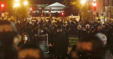 Counter demonstrators face off with law enforcement amid protests against the results of the election, in Washington, D.C., Dec. 12, 2020. (Reuters Photo)