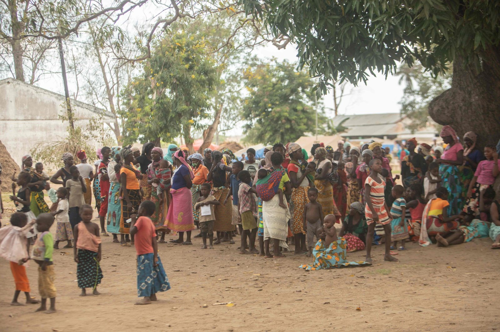 Displaced women meet at the Centro Agrrio de Napala where hundreds of displaced are sheltered after fleeing attacks by armed insurgents in different areas of the province of Cabo Delgado, in northern Mozambique, on Dec. 11, 2020. (AFP Photo)