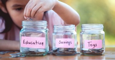 When it comes to money management, experts say the earlier children learn it, the better. (Shutterstock Photo)