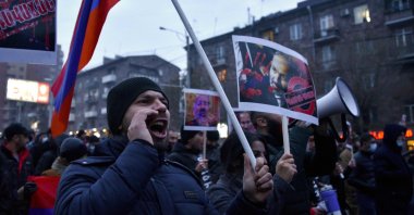 Protesters march through the streets of Yerevan to demand the resignation of Armenian Prime Minister Nikol Pashinian over a controversial peace agreement with Azerbaijan that ended six weeks of war over the formerly occupied Nagorno-Karabakh region, Yerevan, Armenia, Dec. 14, 2020. (AFP Photo)