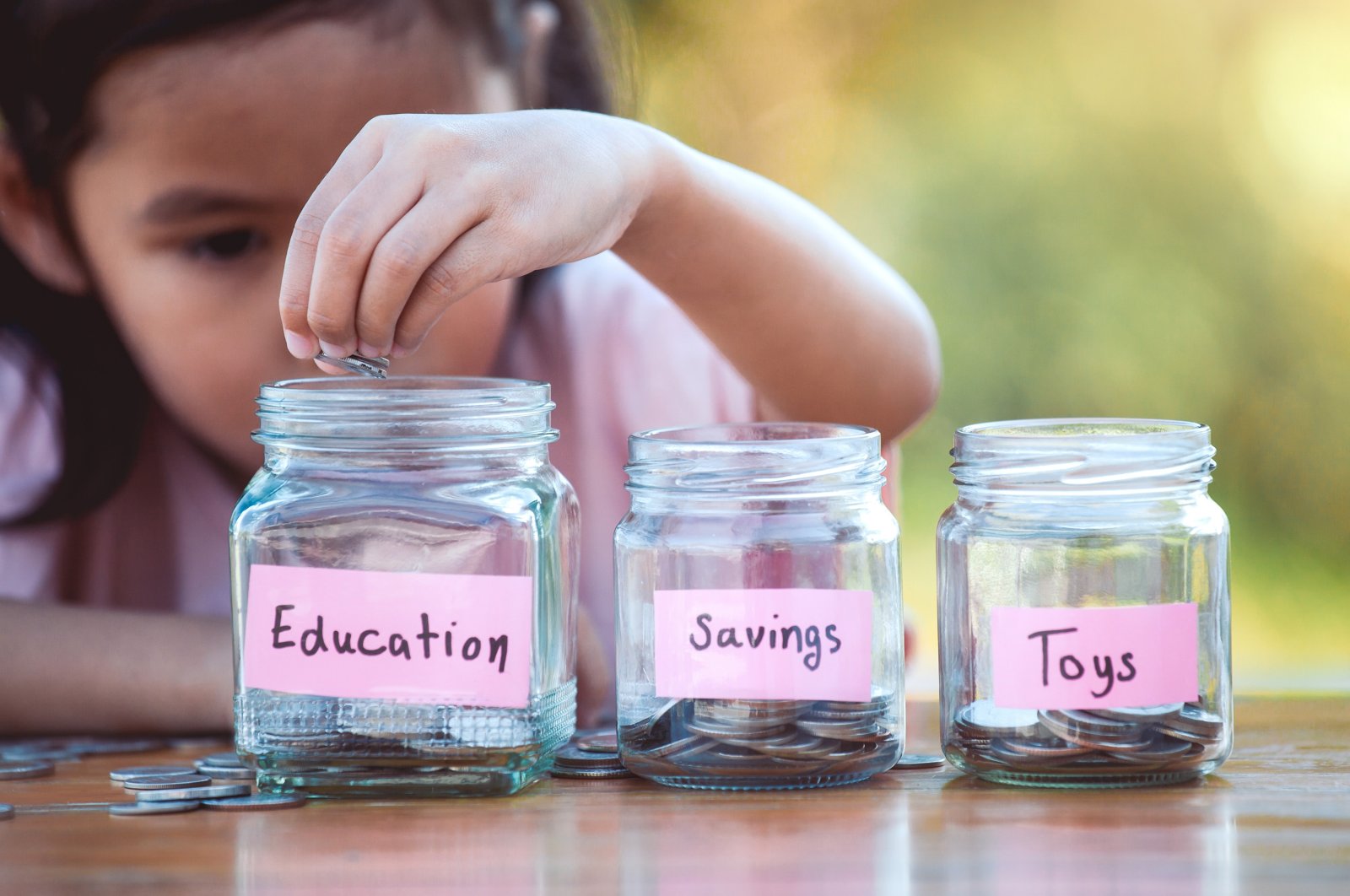 When it comes to money management, experts say the earlier children learn it, the better. (Shutterstock Photo)