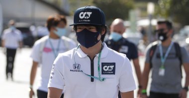 AlphaTauri's Japanese driver Yuki Tsunoda arrives for the first practice session ahead of the F1 Abu Dhabi Grand Prix at the Yas Marina Circuit, in Abu Dhabi, UAE, Dec. 11, 2020. (AFP Photo)