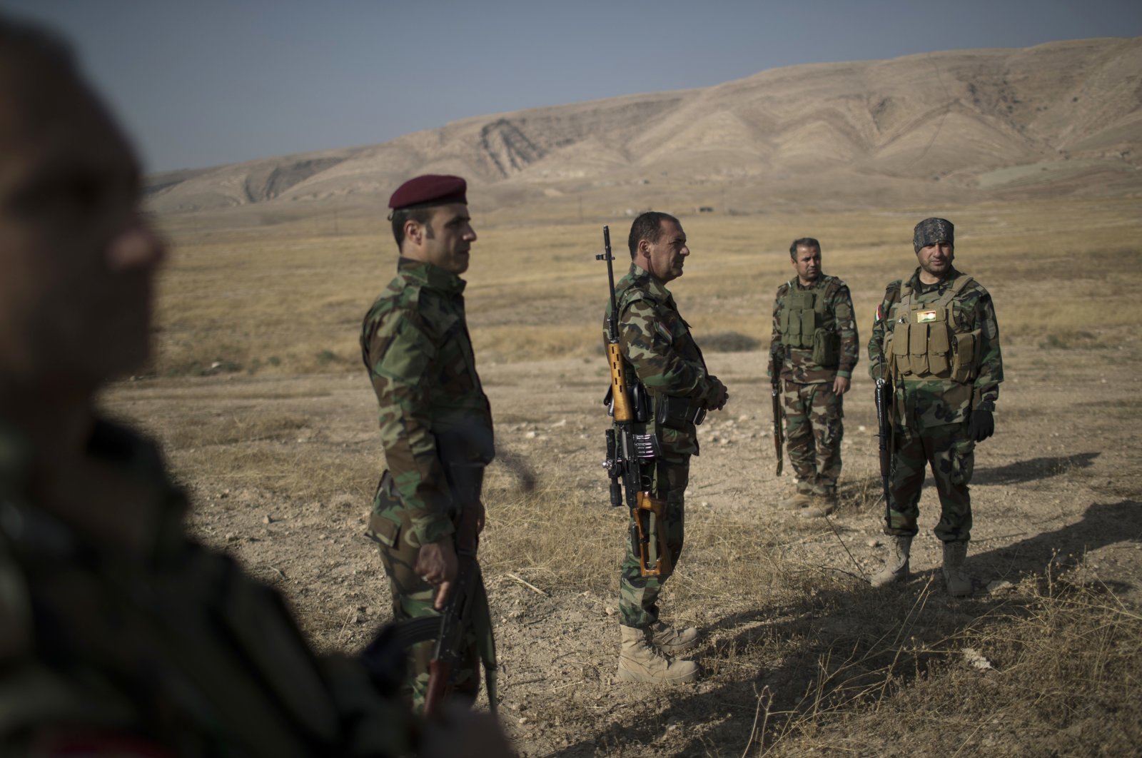 Kurdish Peshmerga fighters gather near a front line in the fight against Daesh terrorists in Bashiqa, east of Mosul, Iraq, Nov. 8, 2016. (AP Photo)