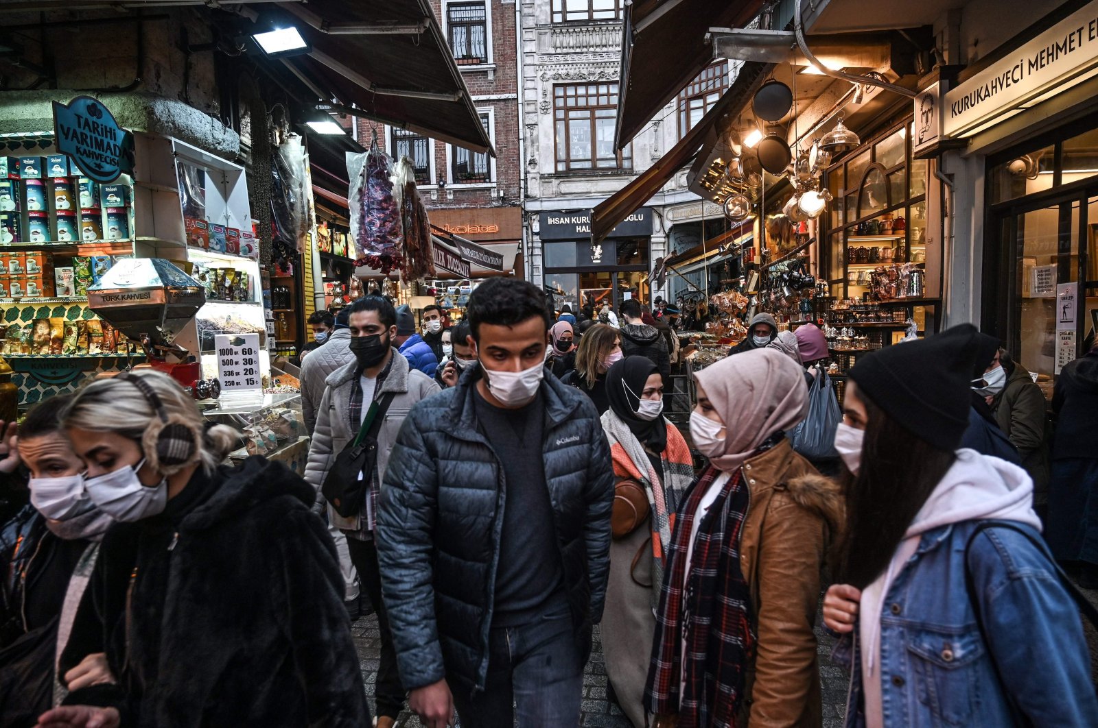 People wearing masks walk on a street in Istanbul, Turkey, Dec. 14, 2020. (AFP Photo)