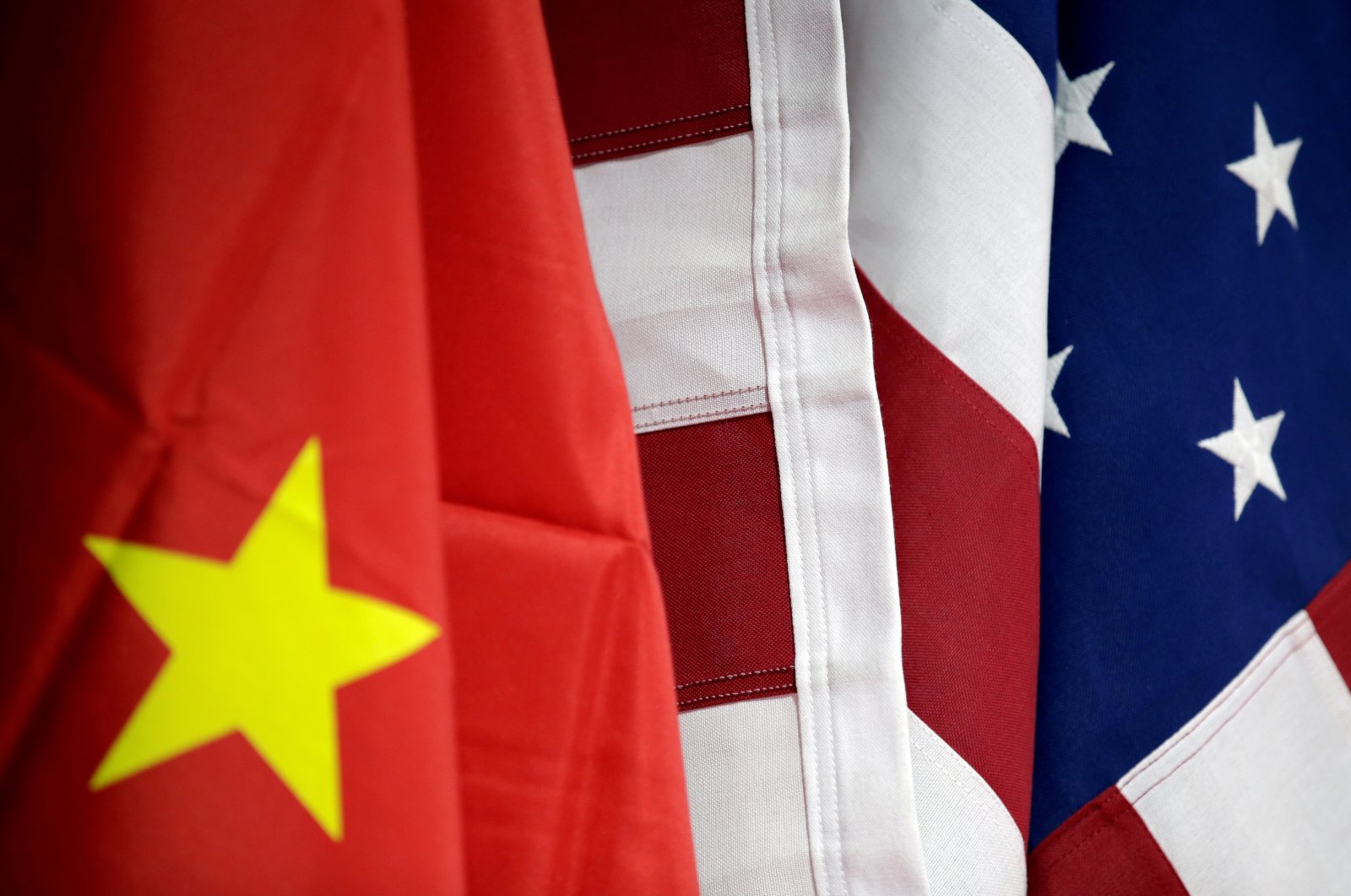 Flags of U.S. and China are displayed at American International Chamber of Commerce (AICC)'s booth during China International Fair for Trade in Services in Beijing, China, May 28, 2019. (Reuters Photo)