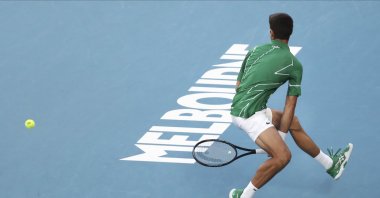 Novak Djokovic plays a ball back to Dominic Thiem during the men's singles final at the Australian Open tennis championship in Melbourne, Australia, Feb. 2, 2020. (AP Photo)