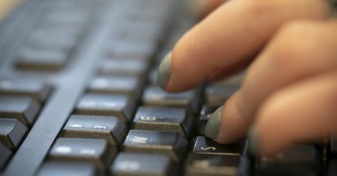 A woman types on a keyboard in New York City, New York, U.S., Oct. 8, 2019. (AP Photo)