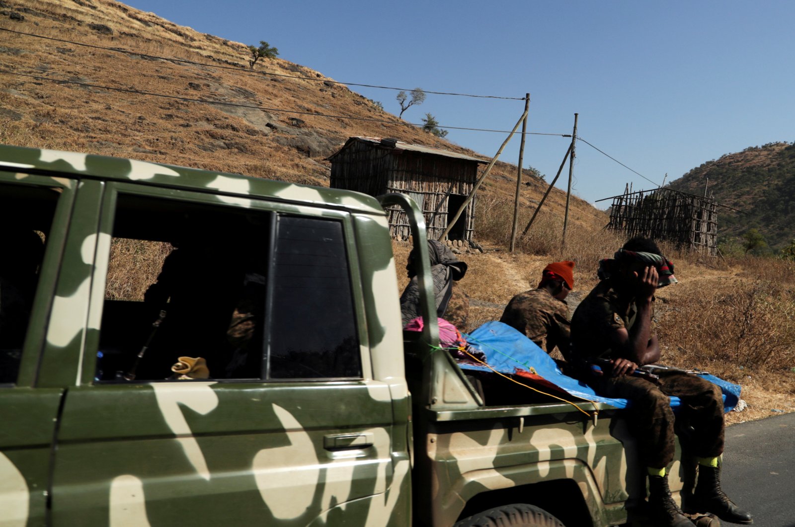 Members of the Ethiopian National Defense Force (ENDF) ride on their pickup truck as they head to a mission in the Sanja, Amhara region, near a border with Tigray, Ethiopia Nov. 9, 2020. (Reuters Photo)