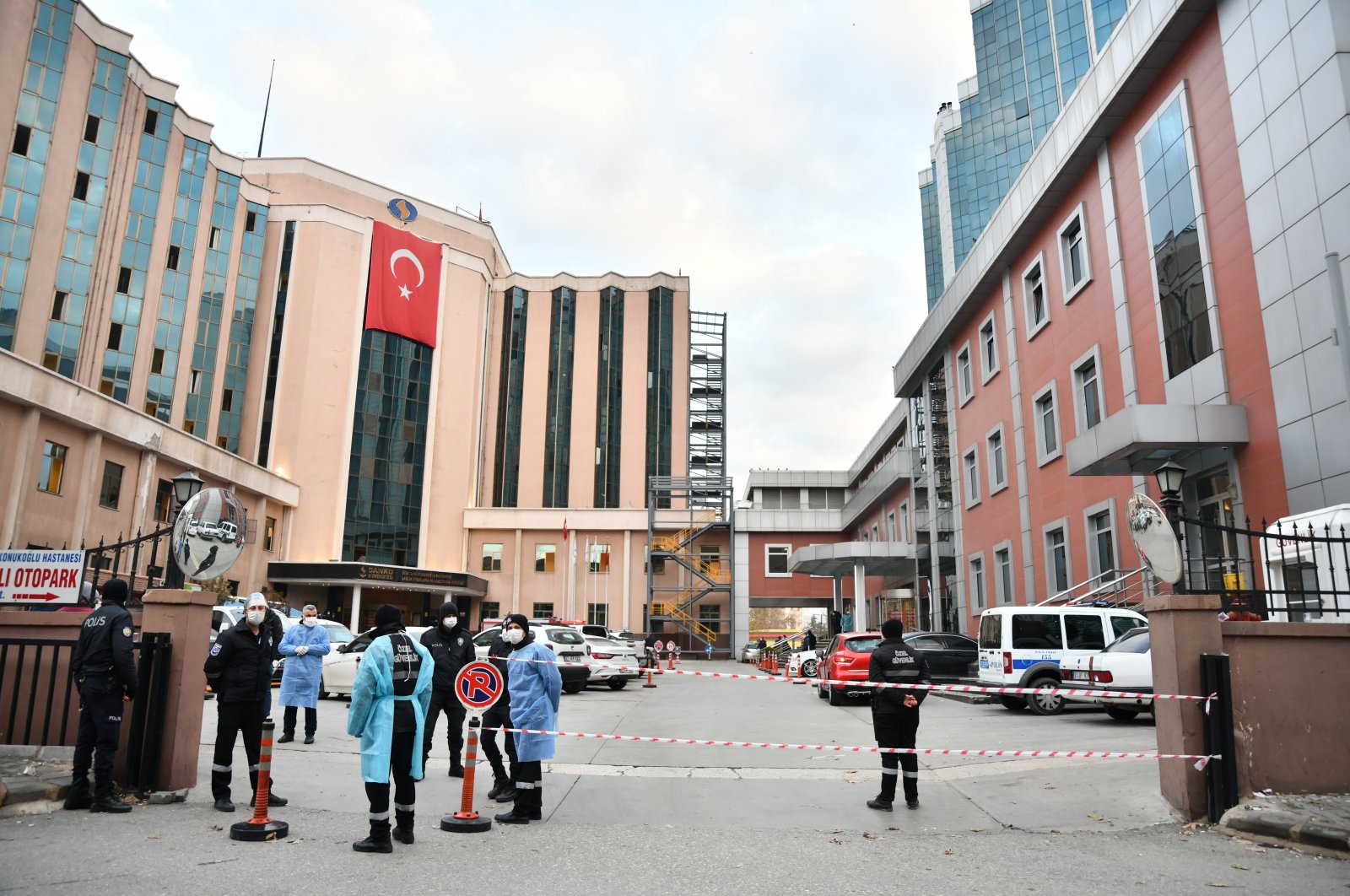 Security personnel stand in front of the SANKO University Hospital following a fire, in Gaziantep, Dec. 19, 2020. (AA Photo)