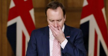 Britain's Health Secretary Matt Hancock gestures, during a coronavirus media briefing, in Downing Street, London, Dec. 14, 2020. (AP Photo)
