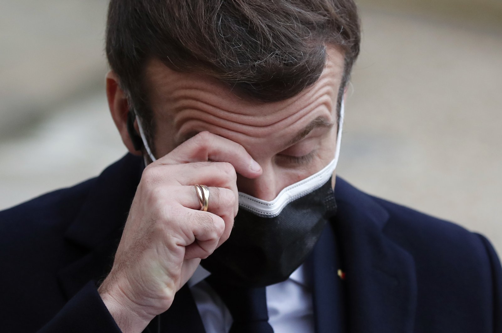 French President Emmanuel Macron reacts as he listen to the speech of Portuguese Prime Minister Antonio Costa, Wednesday, Dec. 16, 2020 in Paris. (AP Photo)