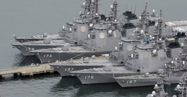 Japan Maritime Self-Defense Force's destroyers equipped with Aegis radar systems, Myoko (175), Atago (177), Chokai (176) and Kongo (173) are anchored at a base in Sasebo, Nagasaki, western Japan, December 2012. (AP Photo)