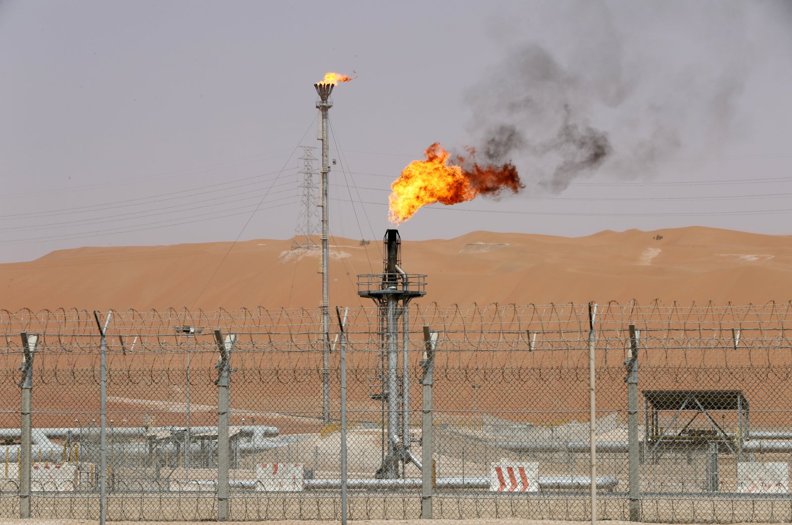 Flames are seen at the production facility of Saudi Aramco's Shaybah oil field in the Empty Quarter, Saudi Arabia, May 22, 2018. (Reuters Photo)