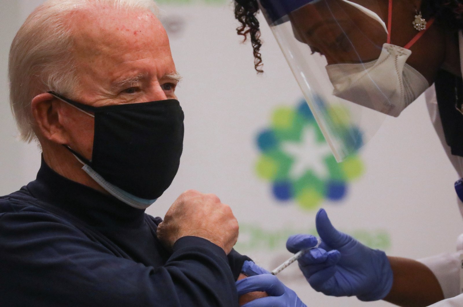 Nurse practitioner Tabe Mase gives U.S. President-elect Joe Biden a dose of a vaccine against the coronavirus disease (COVID-19) at ChristianaCare Christiana Hospital, in Newark, Delaware, U.S., Dec. 21, 2020. (Reuters Photo)