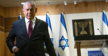 Israeli Prime Minister Benjamin Netanyahu walks after he delivered a statement at the Knesset (Israel's parliament) in Jerusalem, December 22, 2020. (Yonatan Sindel/Pool via Reuters)