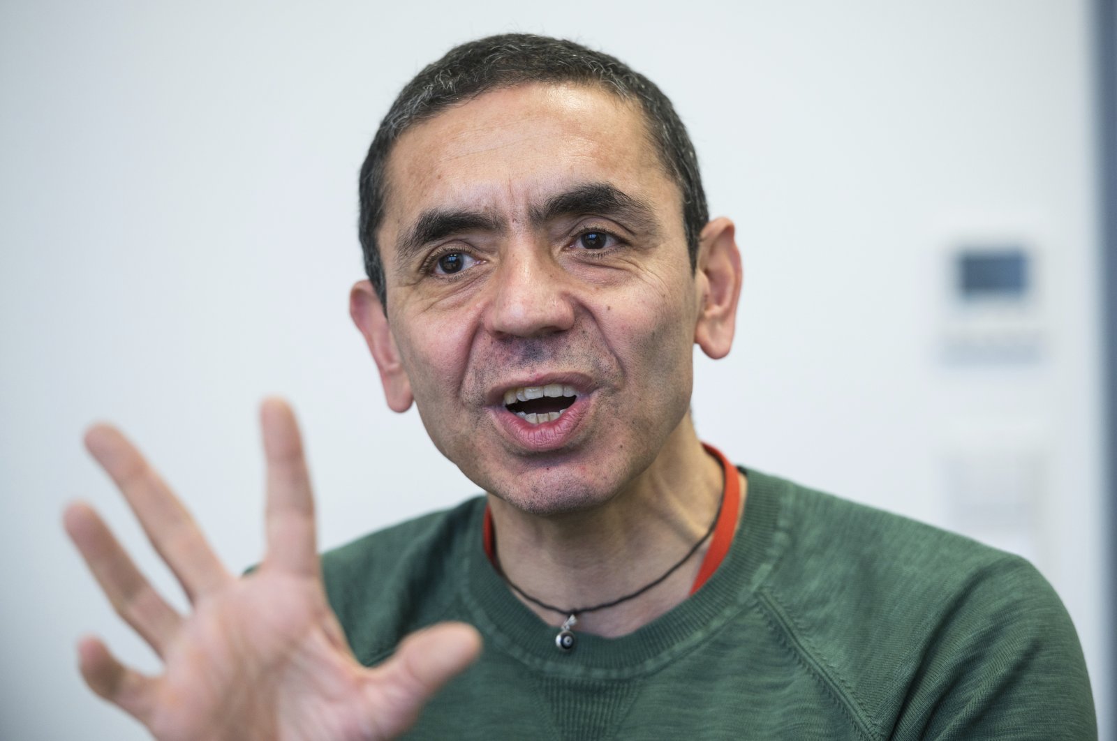 Uğur Şahin, CEO of BioNTech, gestures during an interview in Mainz, Germany, Nov. 27, 2019. (dpa via AP)
