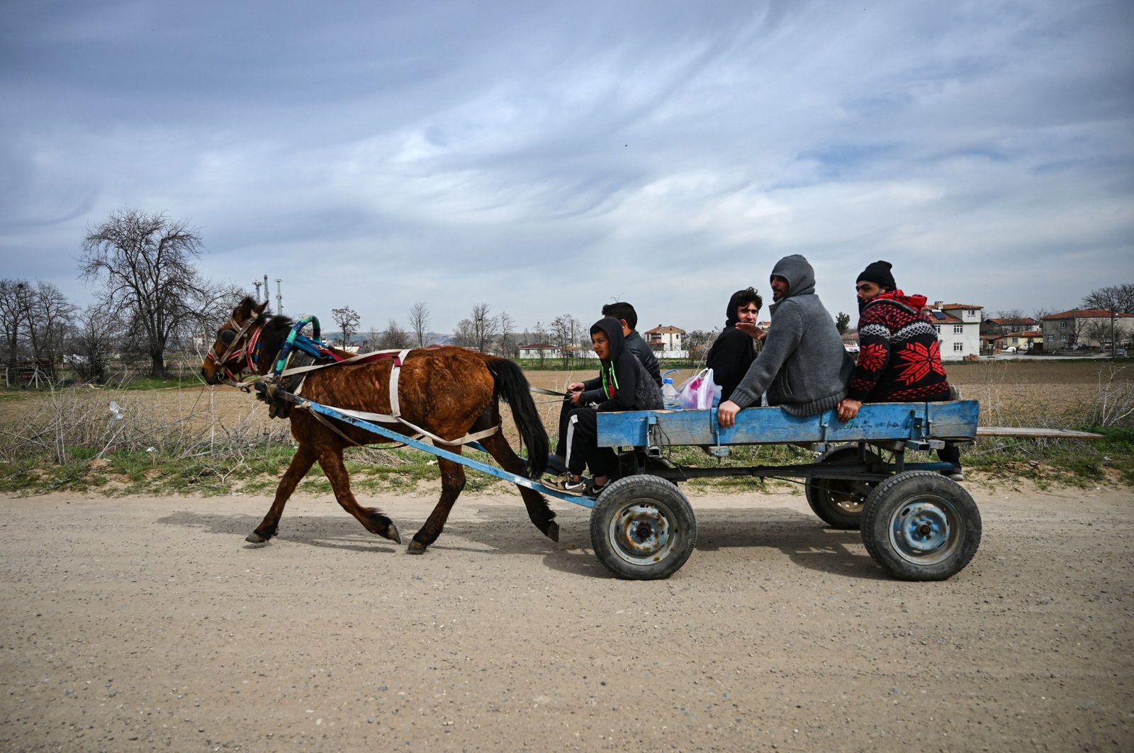 Migrants are on their way to a camp on the Turkish side of the Turkey-Greece border near the Pazarkule crossing gate in Edirne province, March 9, 2020. (AFP Photo)