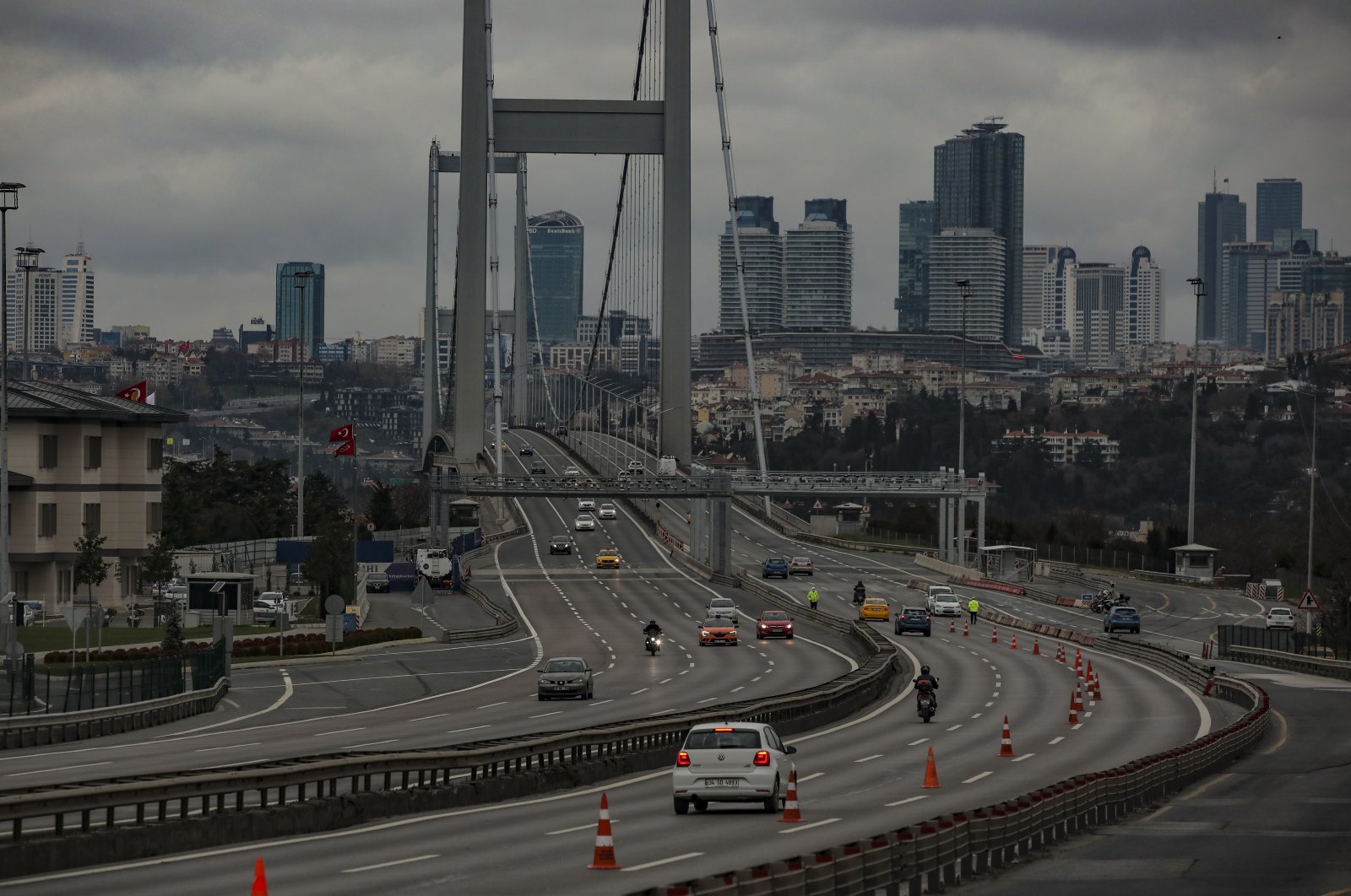 Cars cross the July 15 Martyrs' Bridge, formerly known as the Bosphorus Bridge, during a partial weekend curfew which was imposed to prevent the spread of the coronavirus in Istanbul, Dec. 20, 2020. (AP Photo)