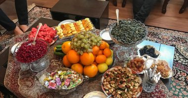 Freshly-dried fruits and nuts on offer on tables prepared for the Shab-e Yalda celebration