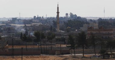 The Syrian town of Tal Abyad is seen from the border between Turkey and Syria, in Akçakale, Şanlıurfa province, southeastern Turkey, Oct. 23, 2019. (AP Photo)