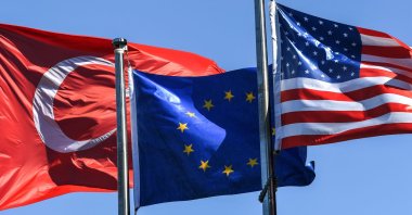 The flags of Turkey, the European Union and the U.S. wave in the wind in the Maslak quarter, Istanbul, Turkey, Aug. 15, 2018.