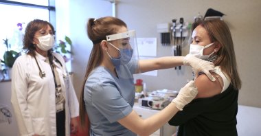A nurse administers a dose of CoronaVac to a volunteer at a hospital in Istanbul, Turkey, Dec. 21, 2020. (AP Photo)