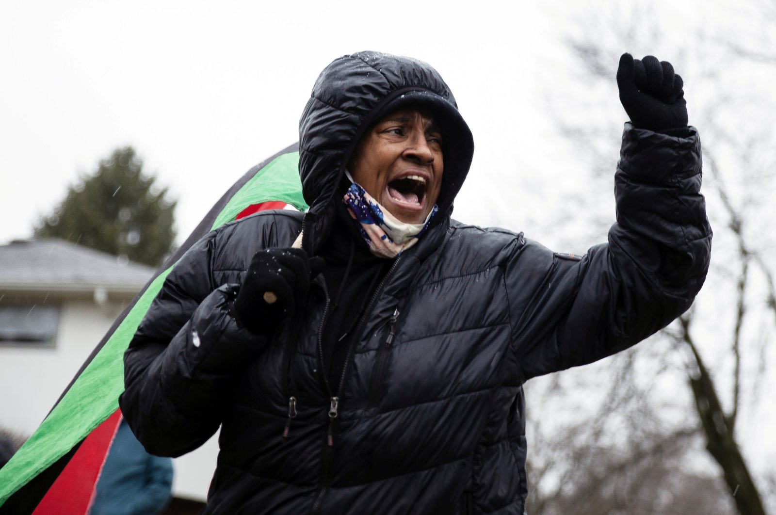 A participant reacts during a protest outside the home where Andre Maurice Hill, 47, was killed in Columbus, Ohio, U.S., Dec. 24, 2020. (Reuters Photo)