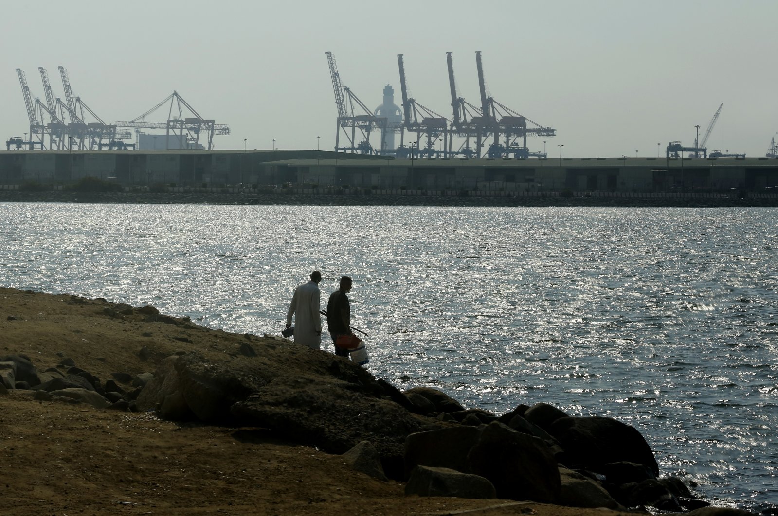 Visitors prepare to fish in front of the Red Sea port, Jiddah, Saudi Arabia, Monday, Dec.14, 2020. (AP File Photo)
